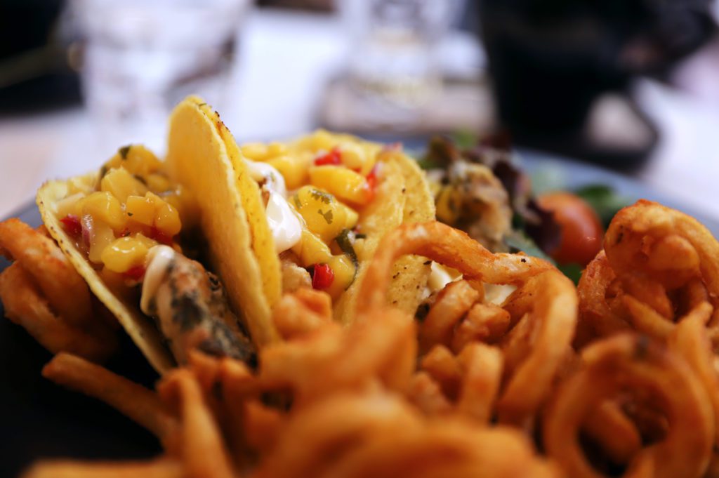 crispy fish tacos and curly fries from The Coffee Academics