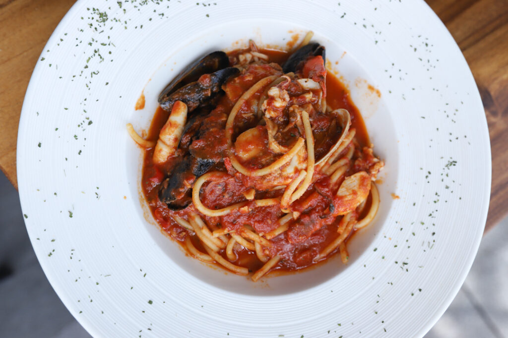 Seafood Marinara Bucatini - tomato based pasta with mussels, prawns and clams
