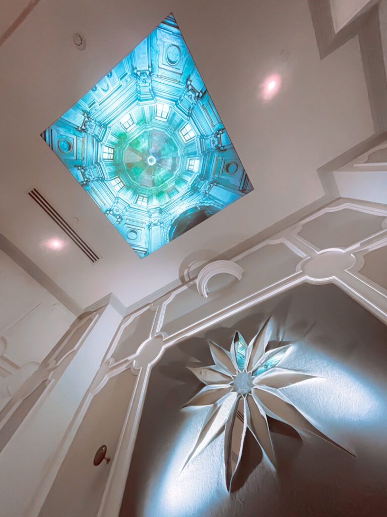 Traditionally, a cupola has a small structure with holes to allow ventilation and natural light