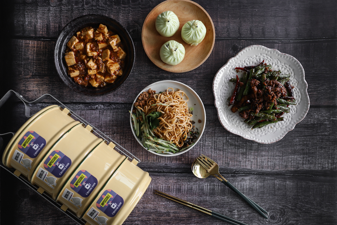 Flat lay of Impossible Pork menu at Crystal Jade La Mian Xiao Long Bao