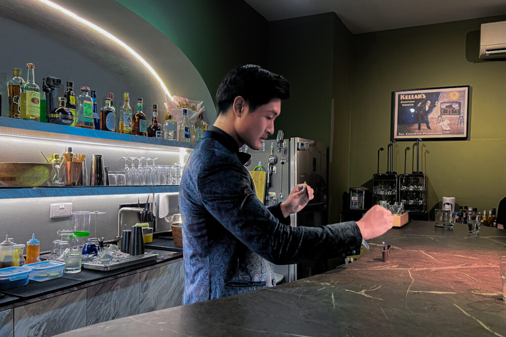 Kai Emmanual practicing magic at Theatre of Wonder