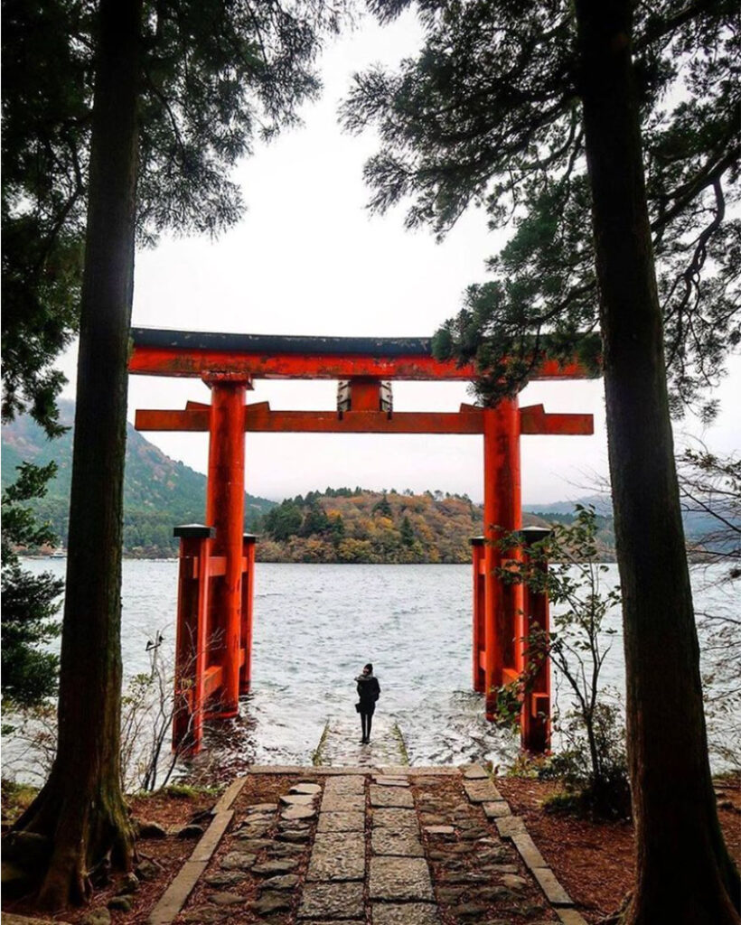 Where is a torii? It's a traditional orange shrine in Japan, and this particular one is a popular tourist attraction at Lake Ashi in Hakone, where many visitors will queue up to an hours to take a photo there
