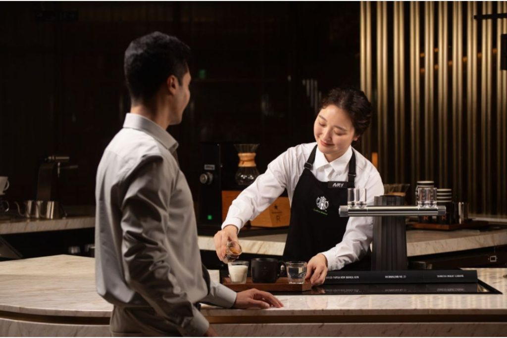 Starbucks barista using OVISO Espresso Machine
