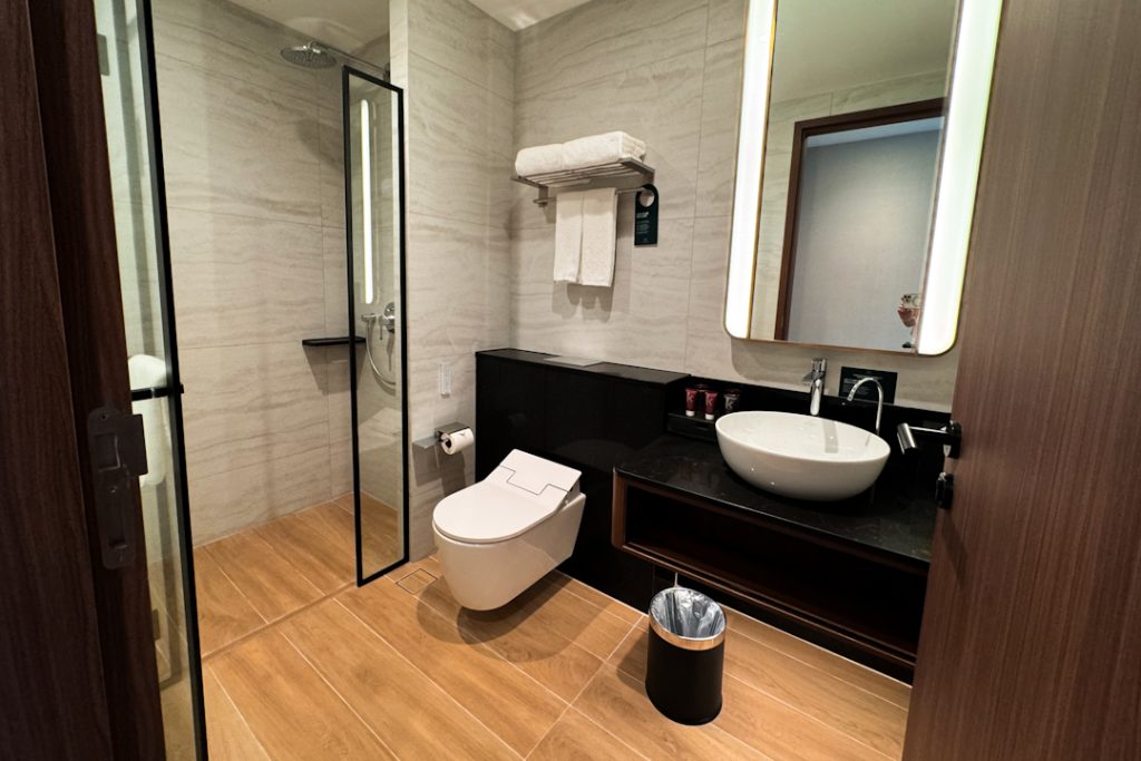 Toilet at Quincy House's serviced apartment rooms
