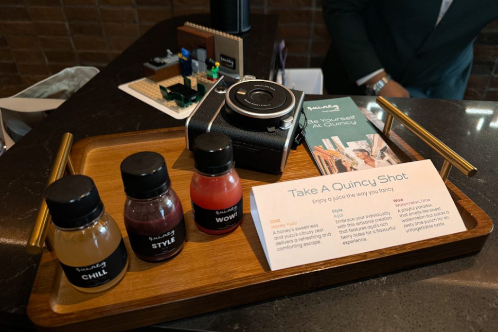 Welcome drinks and polaroid images as part of Quincy House's welcome