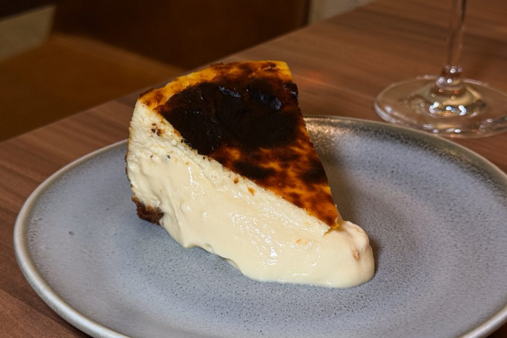 Cross section of Haus Cheesecake - a mix of New York and Basque Burnt Cheesecake