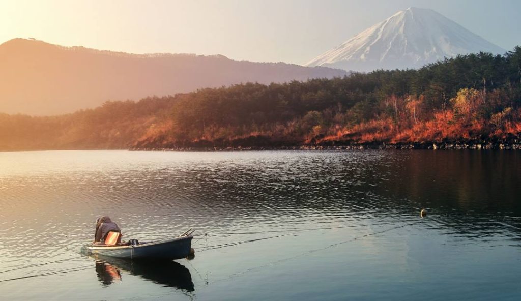 Sunrise and canoe at Lake Saiko