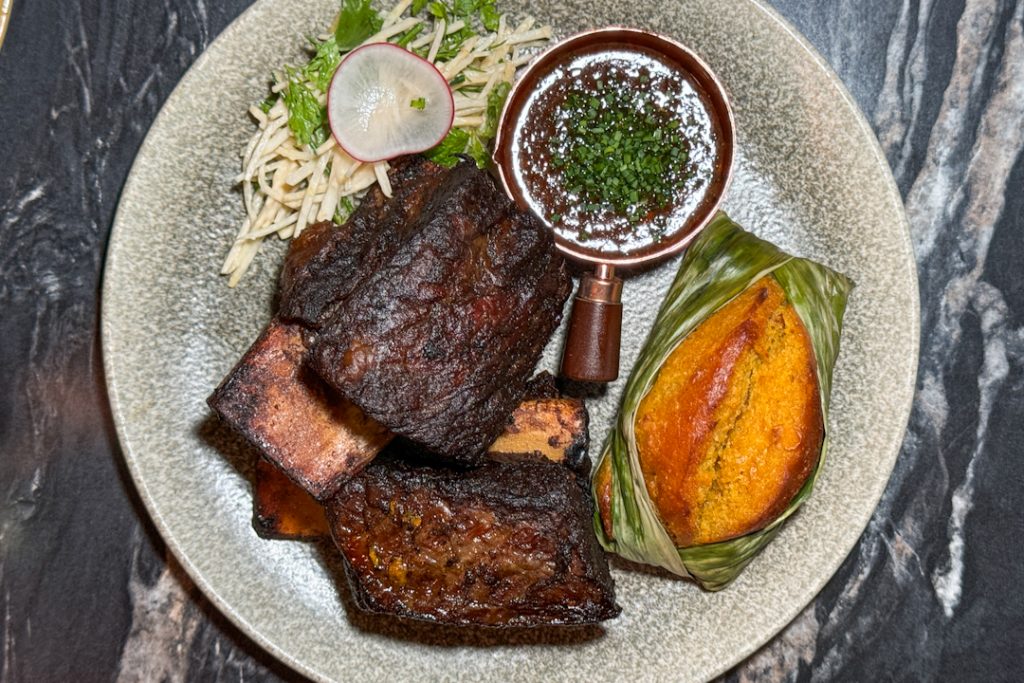 Sticky Beef Ribs with Birria Sauce and corn bread