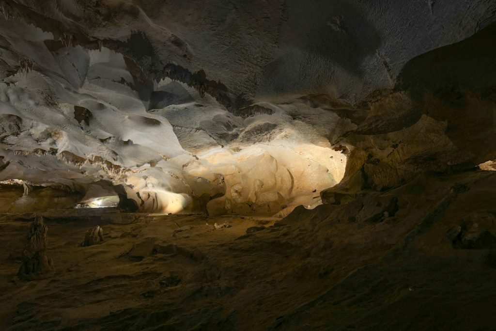 Gorgeous Limestone Caves in Bai Tu Long Bay cruise