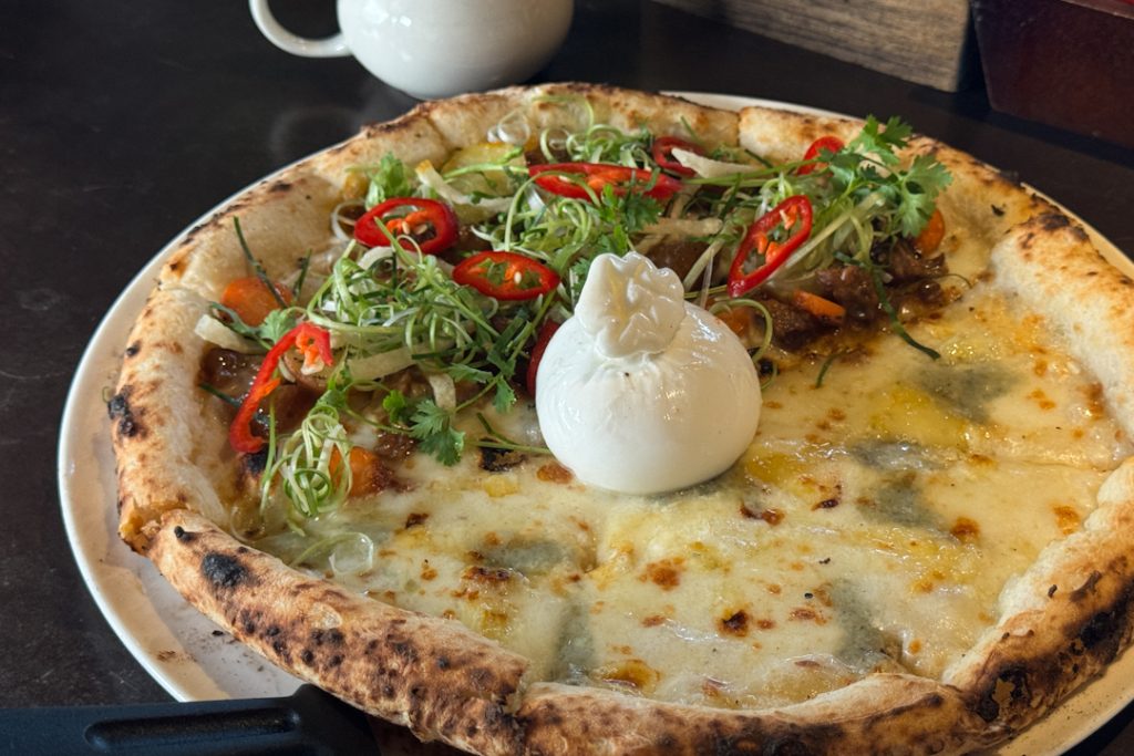 Half and half pizza at Hanoi's Pizza 4Ps flagship outlet at Au Co