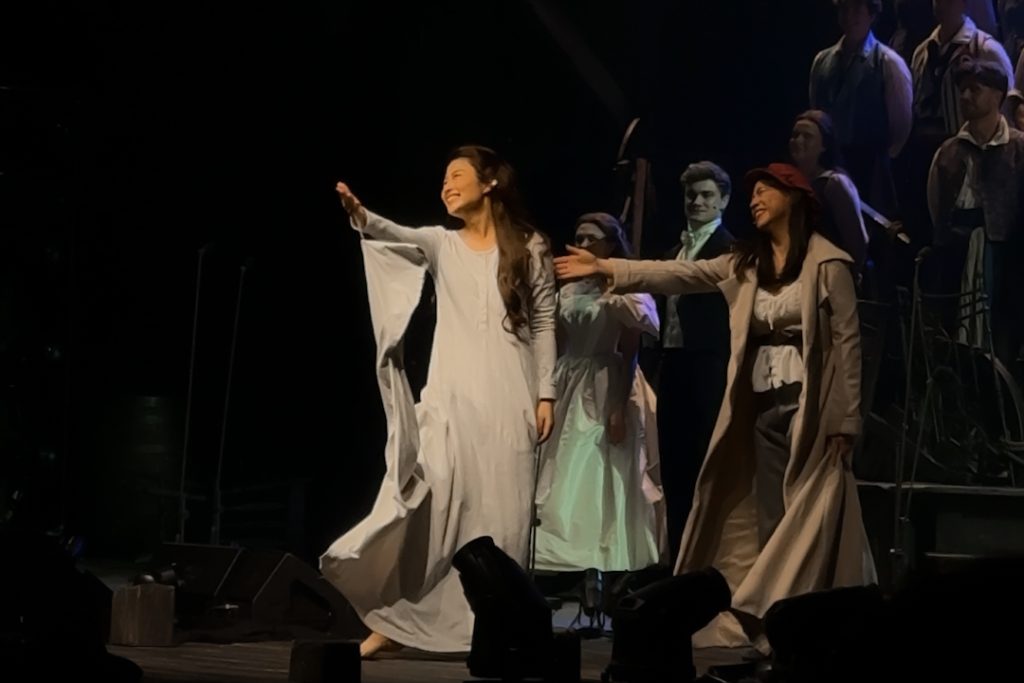 Fantine (played by Na-Young Jeon) and Eponine (played by Nathania Ong)
