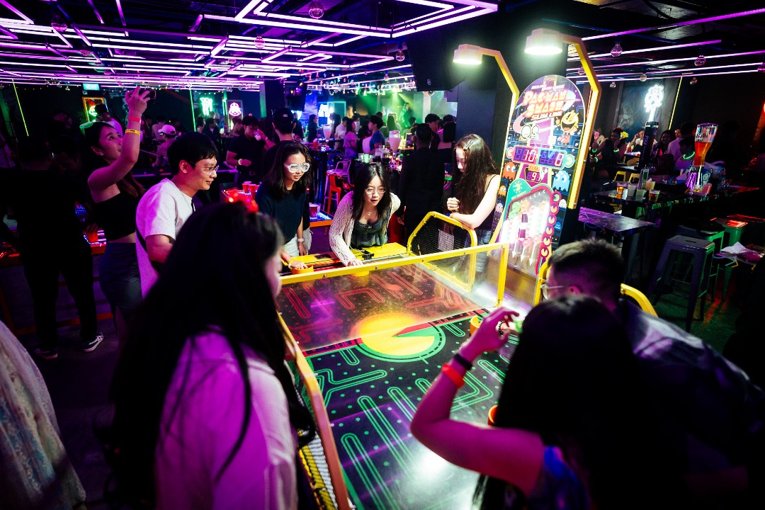 Arcade cabinets and bar setup at Level Up Bar & Arcade, Clarke Quay