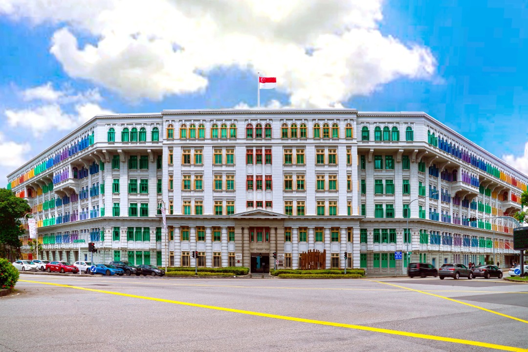 Rainbow-coloured windows across the facade of Old Hill Street Police Station, Singapore