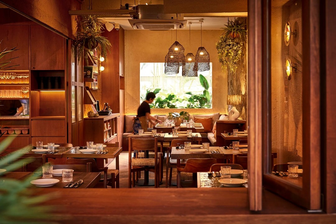 Vinyl lounge and lending library interior at MyX, Chip Bee Gardens