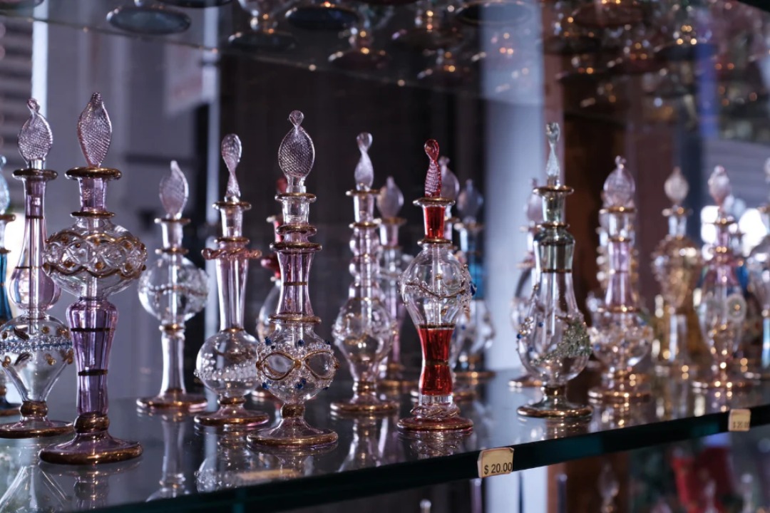 Ornate hand-blown glass perfume bottles at Jamal Kazura Aromatics